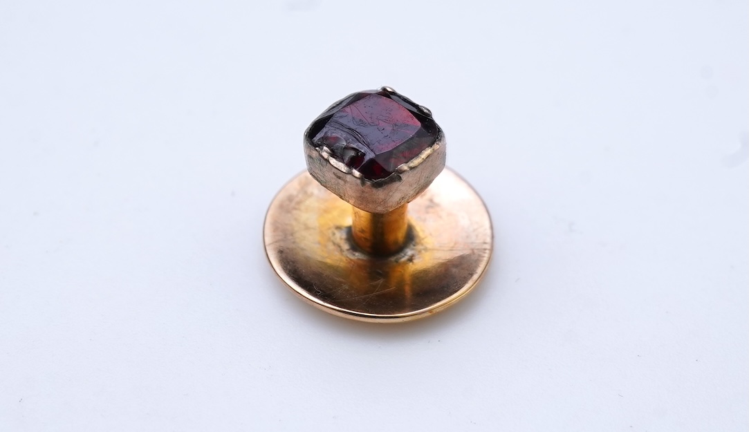 A collection of cufflinks and dress studs